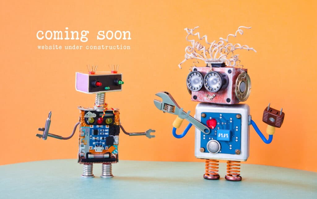 Funny robot images declaring the website is coming soon