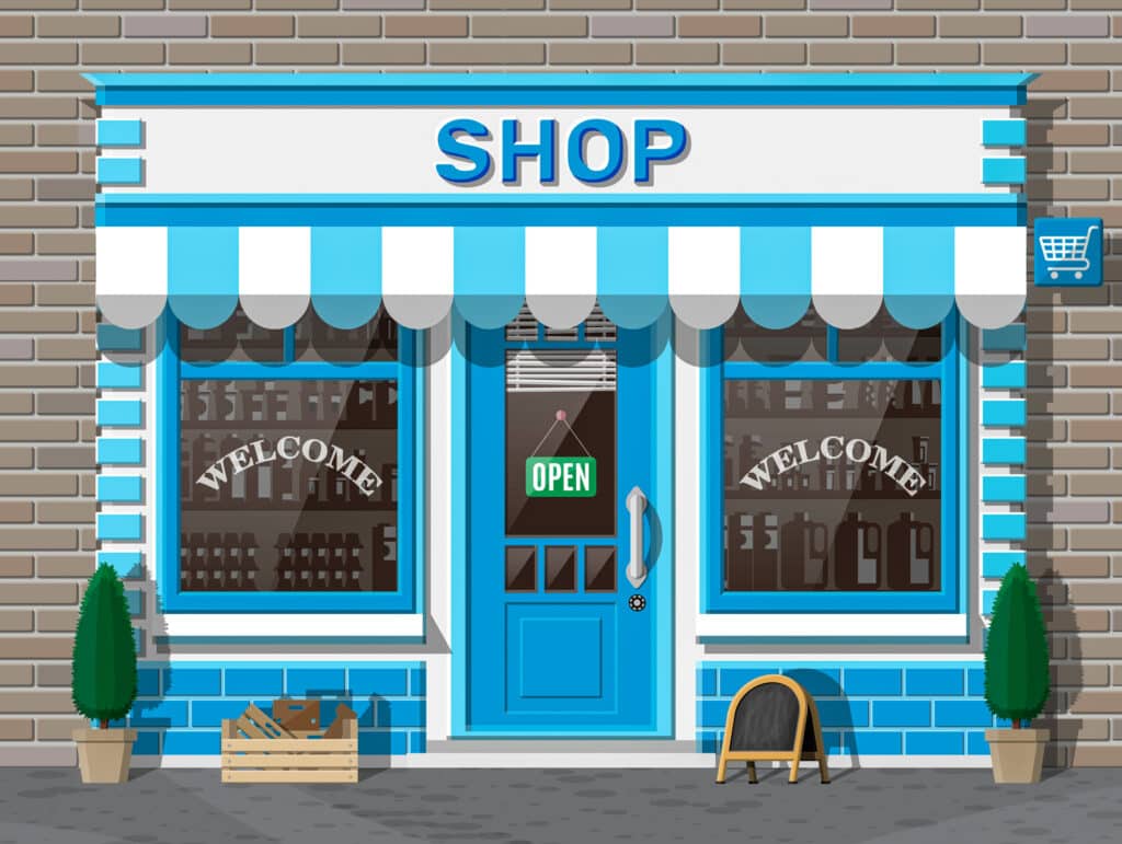Vintage storefront in blue colors and the word Shop